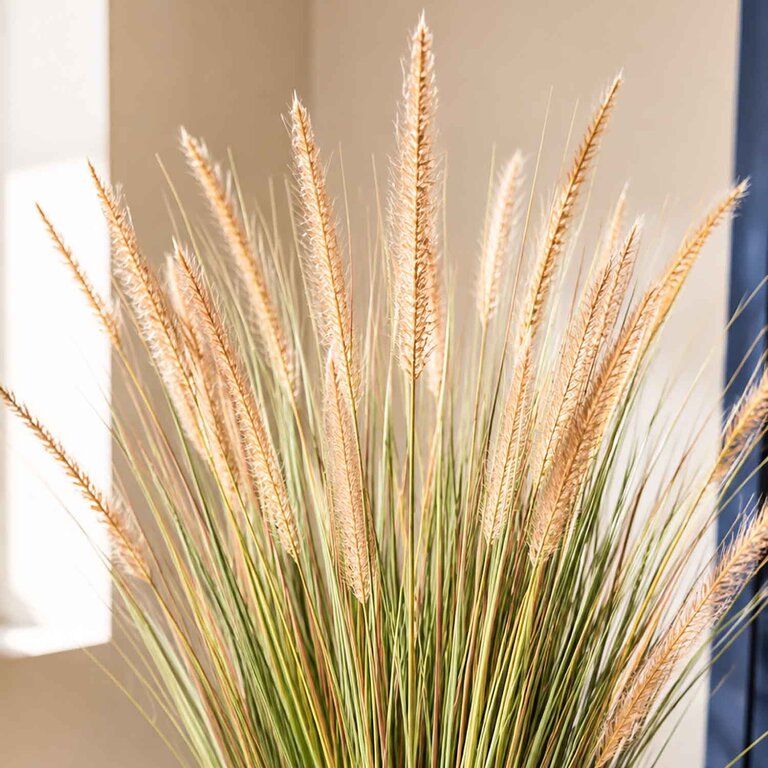 Kunstplant Pennisetum gras is een kunstgras in binnenpot met een natuurgetrouwe uitstraling en een hoogte van 99 cm.