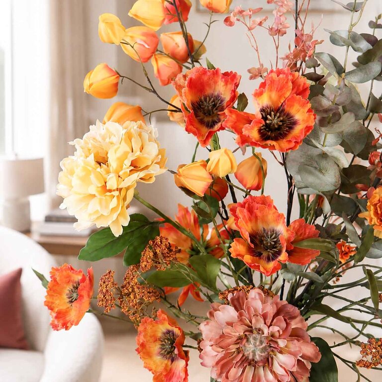 Zijden bloemen boeket Josie Rae is een groot en warm herfstboeket van kunstbloemen in oranje, roze, gele en groene tinten.