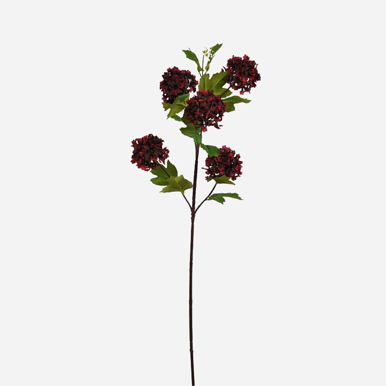 Kunststeel Sneeuwbal met donkerpaarse zijden bloemen en groene bladeren is een kunststeel met een natuurgetrouwe uitstraling en een lengte van 77 cm.