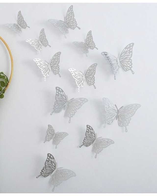 Zilveren plastic vlinders  12st