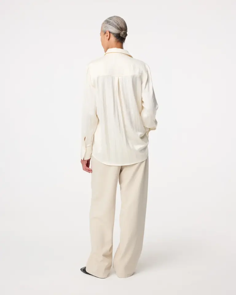 Knit-ted Leo Blouse