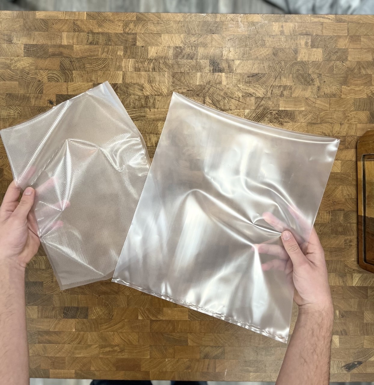 Wat is het verschil tussen een structuur zak en een gladde vacuumzak?