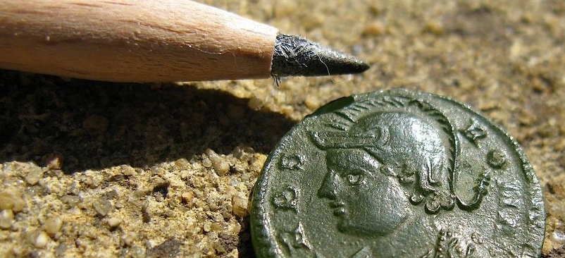 Wie reinigt man alte Münzen?