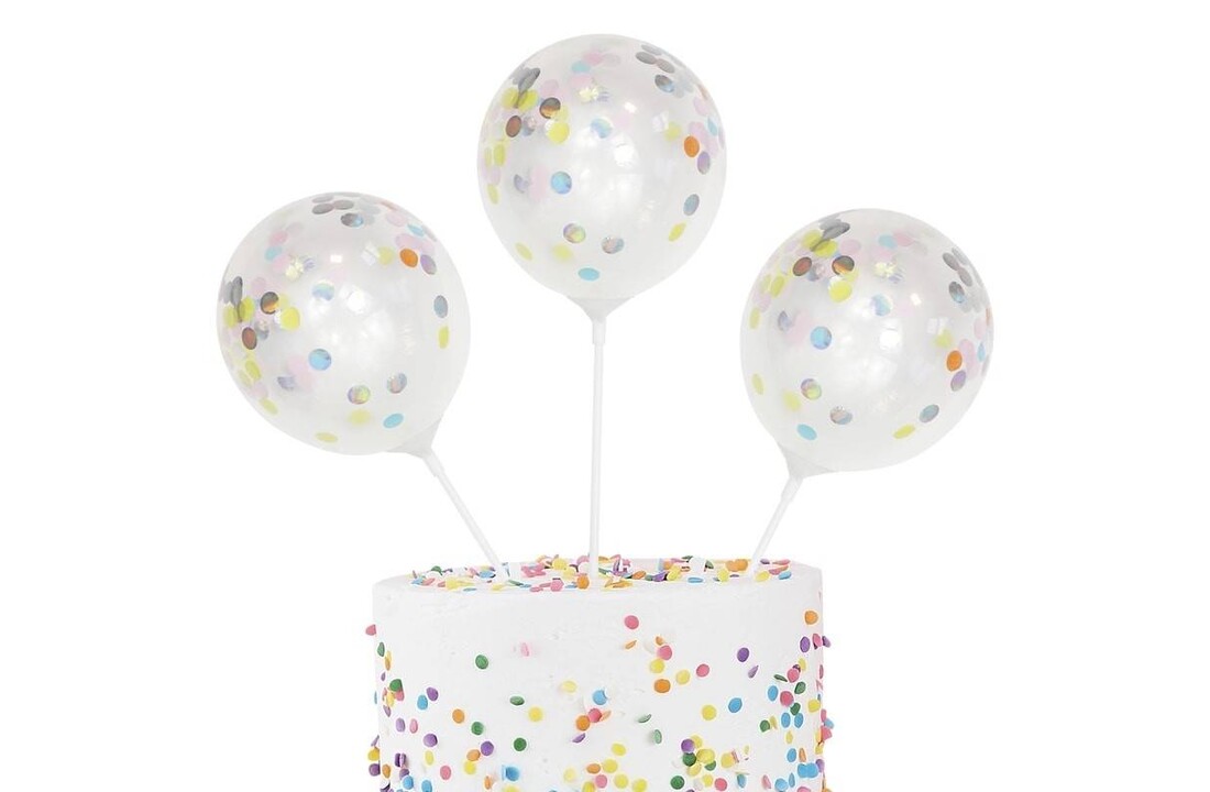 Taarttopper met ballonnen met gekleurde confetti