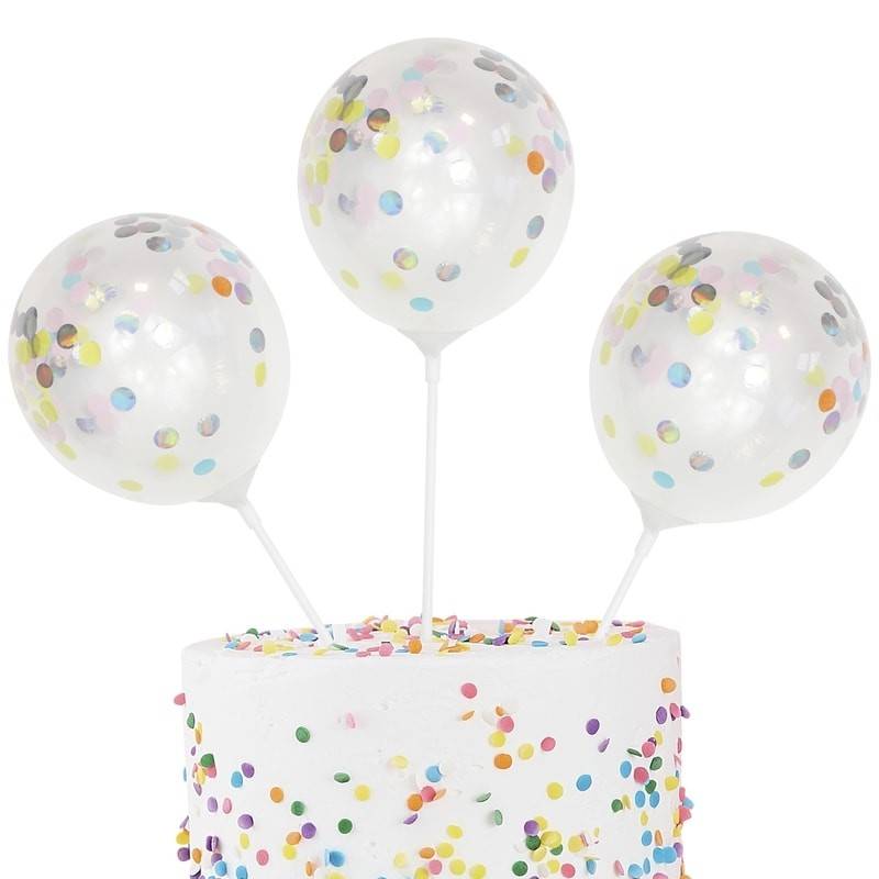 Taarttopper met ballonnen met gekleurde confetti