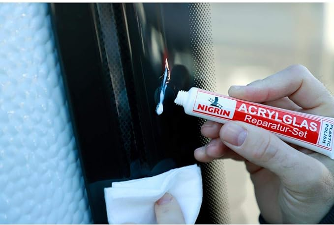 Nigrin NIGRIN CARAVAN Kunststoffscheiben-Politur (Set: 2x Politurpaste 25 g, Schleifpapier, Poliertuch)