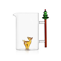 Glazen kruik met ree of bambi en kerstboom op het handvat