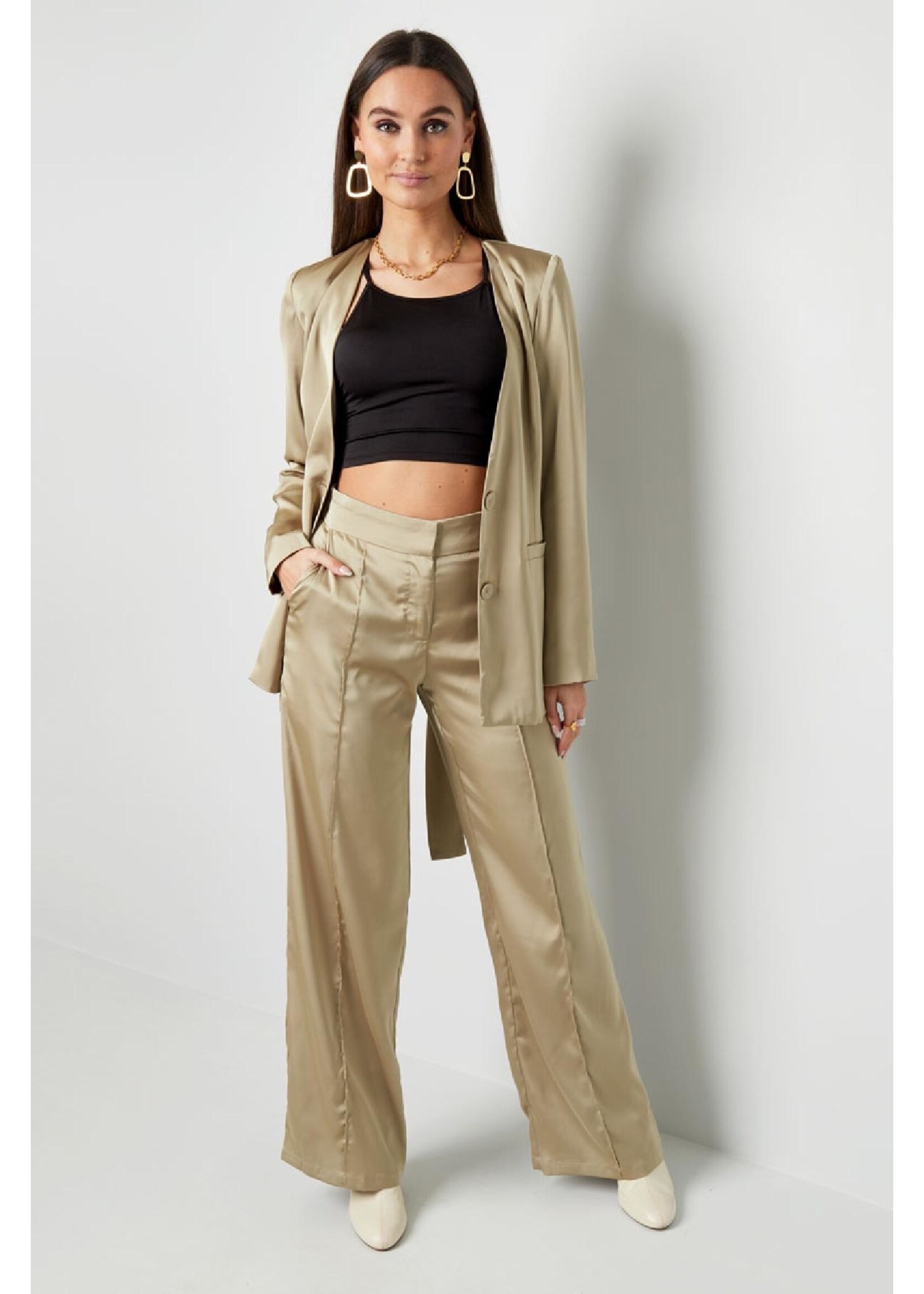 Pantalon glimmende stof creme M