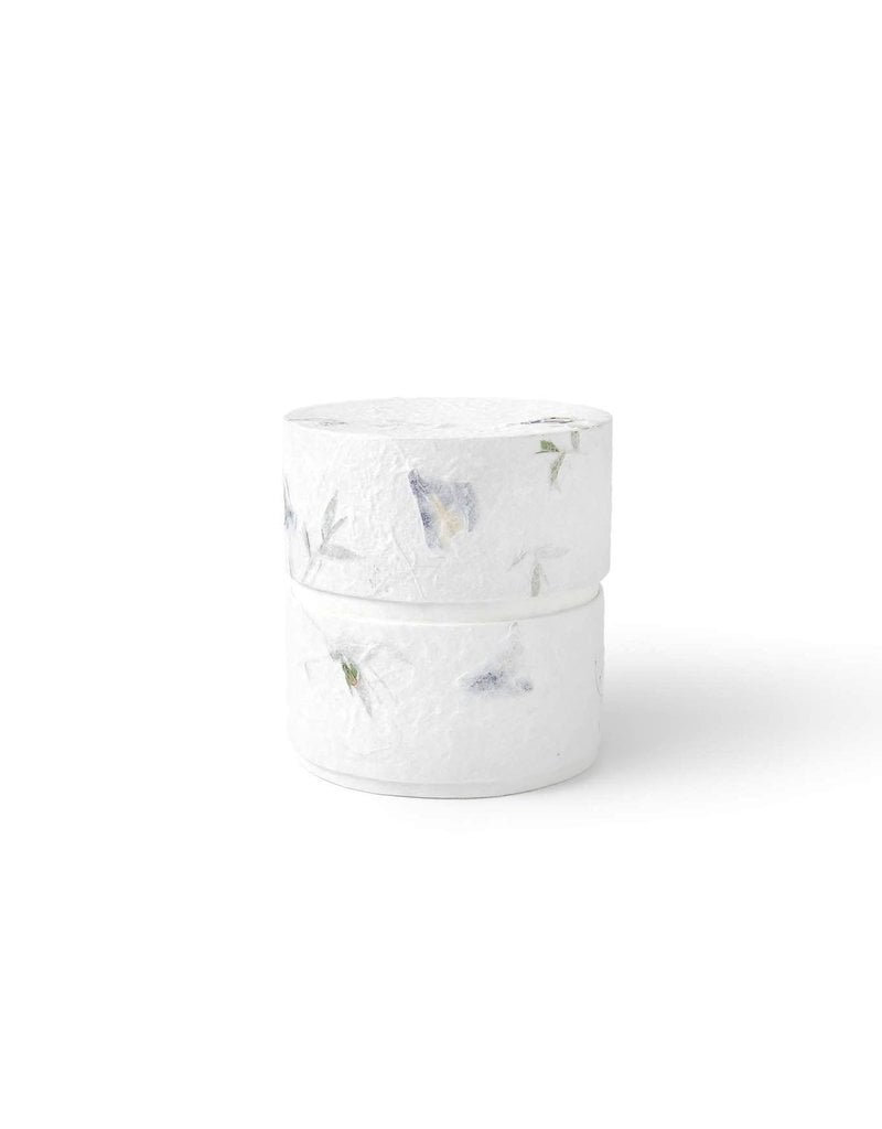 . Eco urn covered with natural paper with flowers