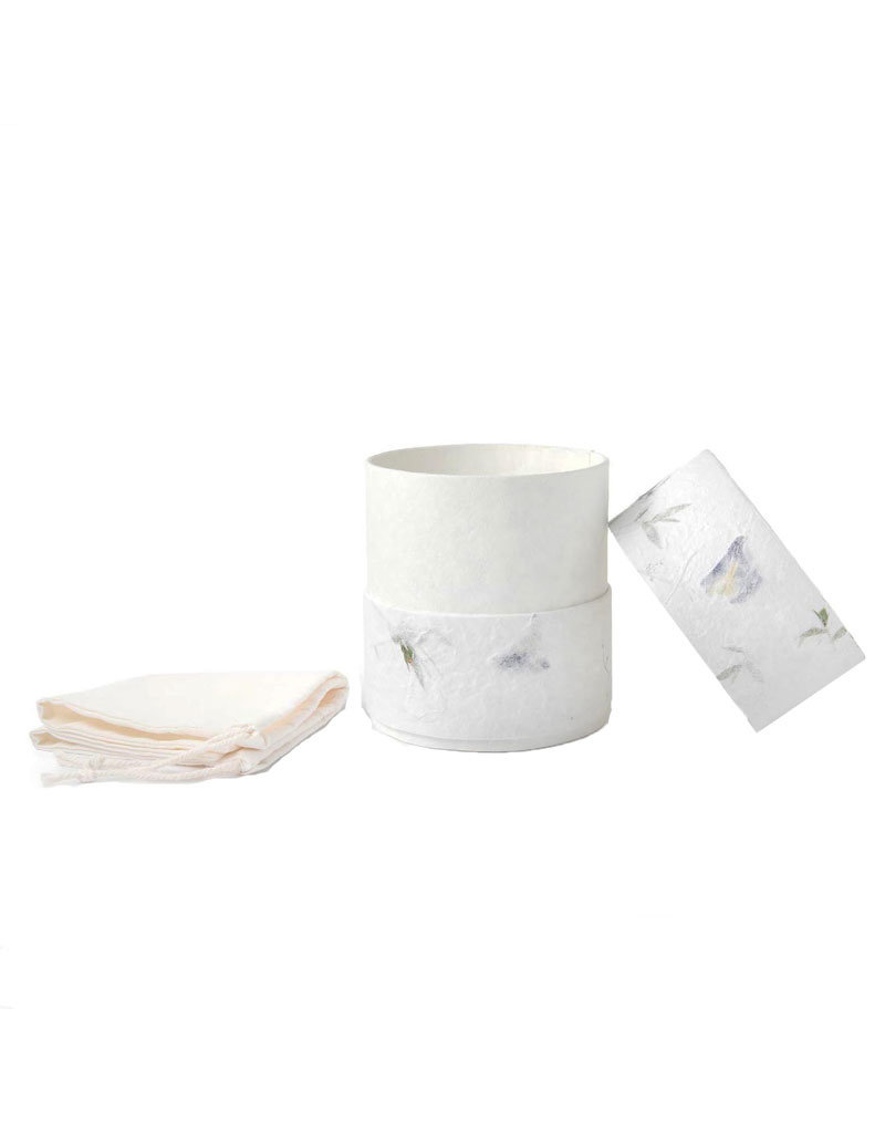 . Eco urn covered with natural paper with flowers