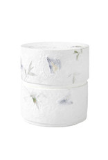. Eco urn covered with natural paper with flowers