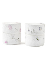 . Eco urn covered with natural paper with flowers