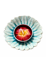 plat en porcelaine avec bougie chauffe-plat