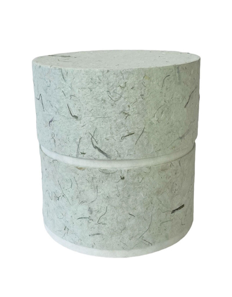 . Eco urn covered with natural paper with flowers