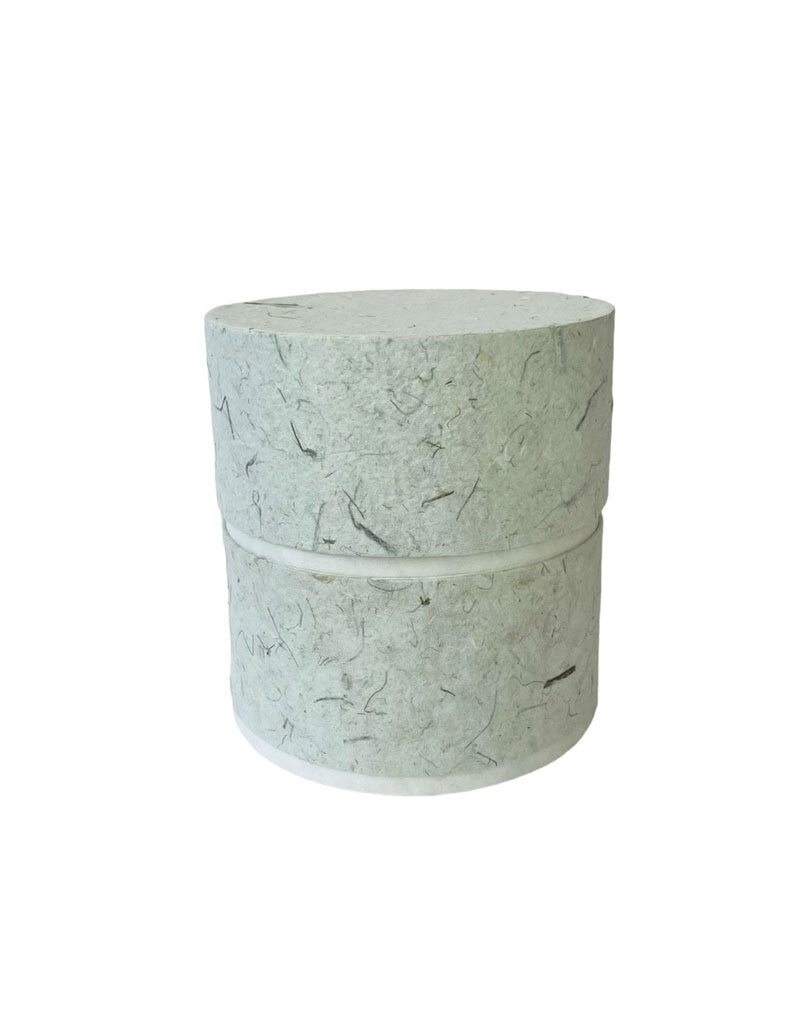 . Eco urn covered with natural paper with flowers