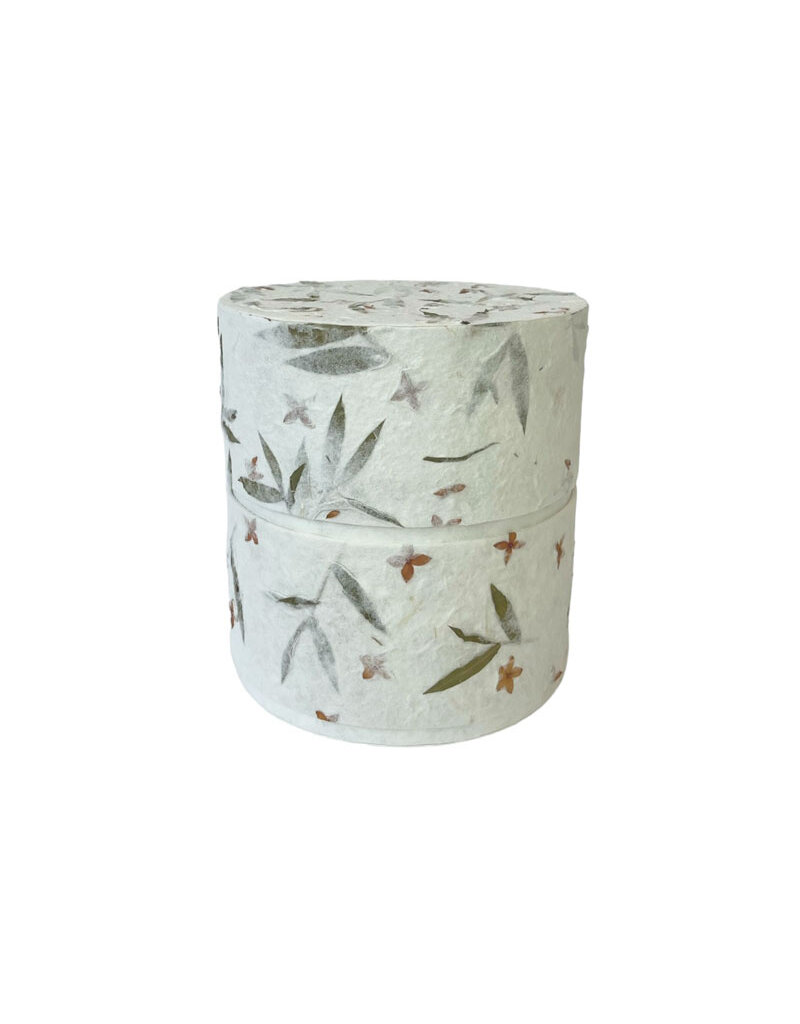 . Eco urn covered with natural paper with flowers