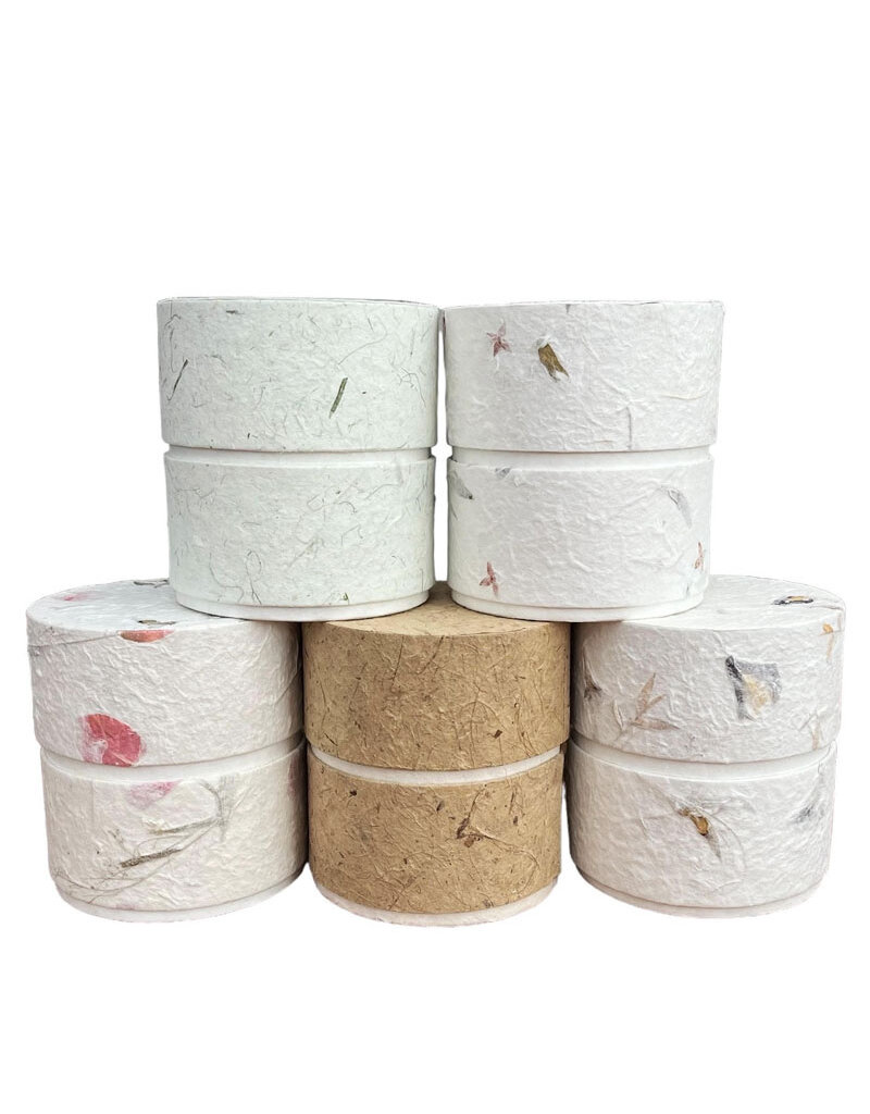 . Eco urn covered with natural paper with flowers