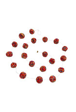 . guirlande de décoration avec boules à pompons