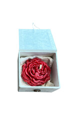 Box with rose-shaped natural wax candle