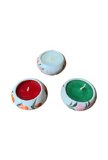 Large round candle in porcelain.