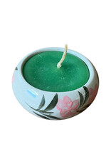 Large round candle in porcelain.