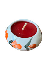 Large round candle in porcelain.