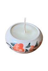 Large round candle in porcelain.