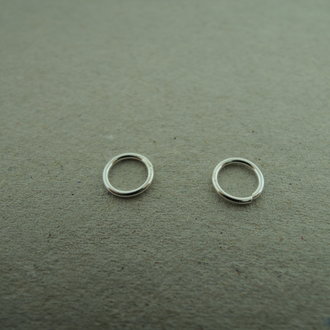 ENLC40-07 (per 50 stuks) Ag925 GESLOTEN OOG 4X0.7MM