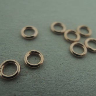 RENLC41-08 (per 100 stuks)  GESLOTEN OOG Ag925 GOLD PLATED ROSE DIAMETER 4.1MM EN 0.8MM DRAADDIKTE