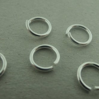 ENLO70-10 OPEN OGEN(50 stuks) Ag925 7MM DIAMETER 1MM DRAADDIKTE ROND