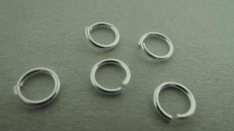 ENLO70-10 OPEN OGEN(50 stuks) Ag925 7MM DIAMETER 1MM DRAADDIKTE ROND