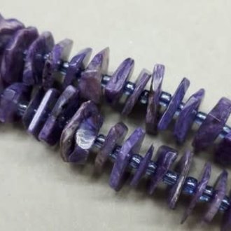 9950 KRAAL CHAROIET PAARS +-12MM ONREGELMATIG SCHIJFJE