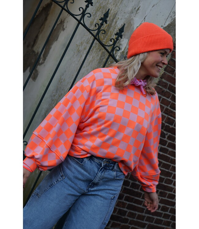 SWEATER GEBLOKT ORANJE ROZE