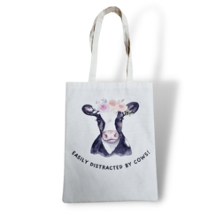 Canvas bag easily distracted by cows