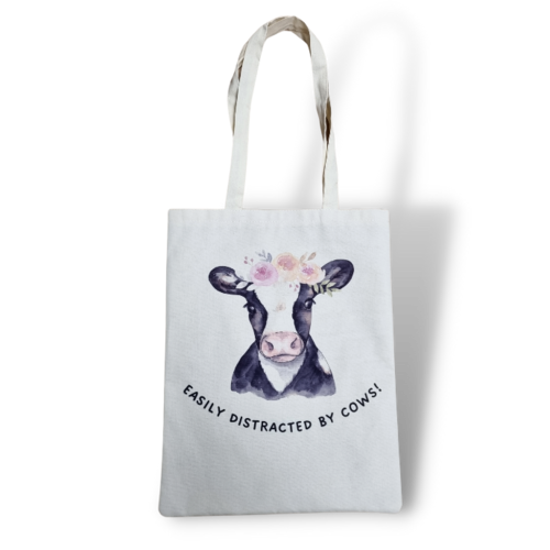 Canvas bag easily distracted by cows