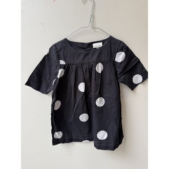 Preloved 4. Pomp de luxe top witte bollen zwart-wit // 122-128