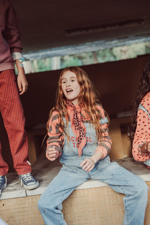 Piupiuchick dungarees // faded light blue denim with school trip print