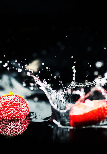 Red fruit into water