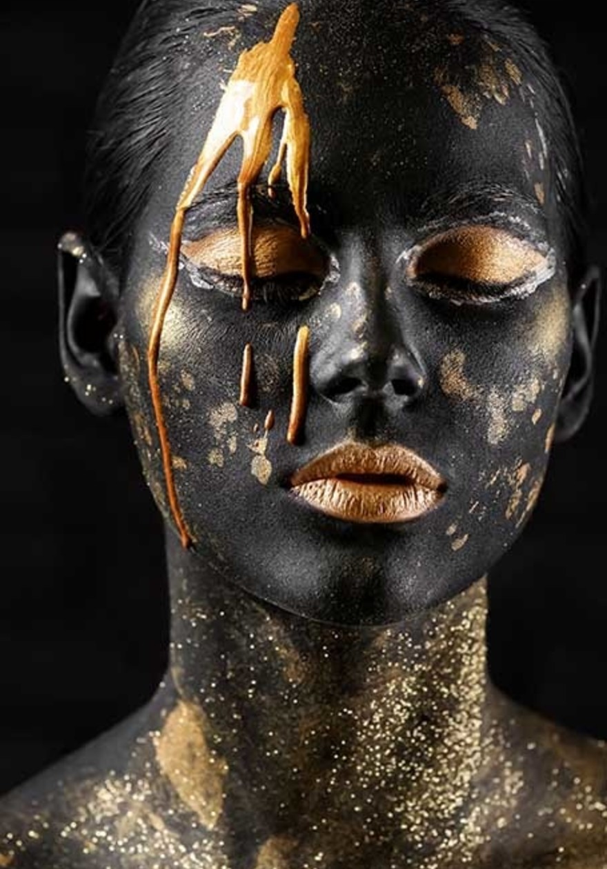 Black and gold face