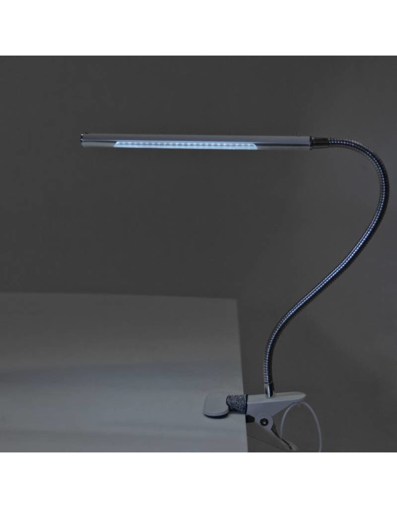 Merkloos LED Tafellamp Goud met een flexibele arm op tafelklem.