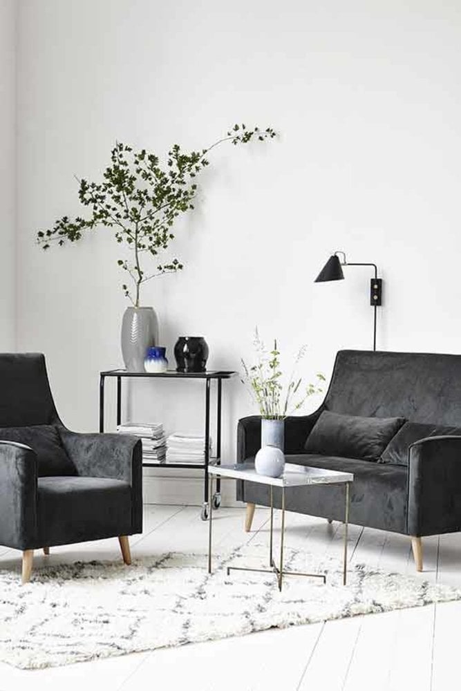 House Doctor Club-Wandleuchte schwarz Metall Messing