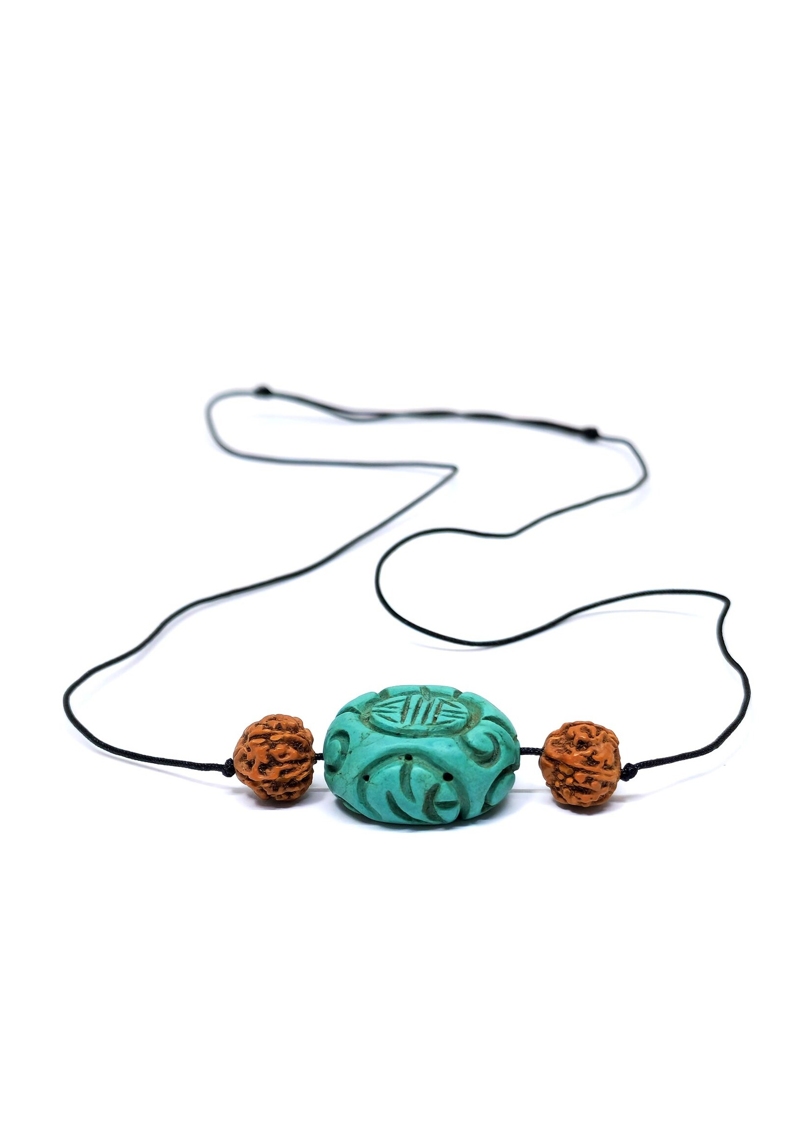 Necklace with turquoise color stone pendant and rudraksha beads