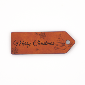 Marlaine Leren label 'Merry Christmas' 25x75mm Chestnut - 2 stuks Leren label 'Merry Christmas' 25x75mm Chestnut - 2 stuks