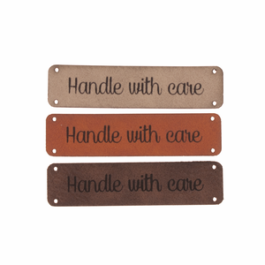 Leren label 'Handle with care' 15x60mm - 2 stuks