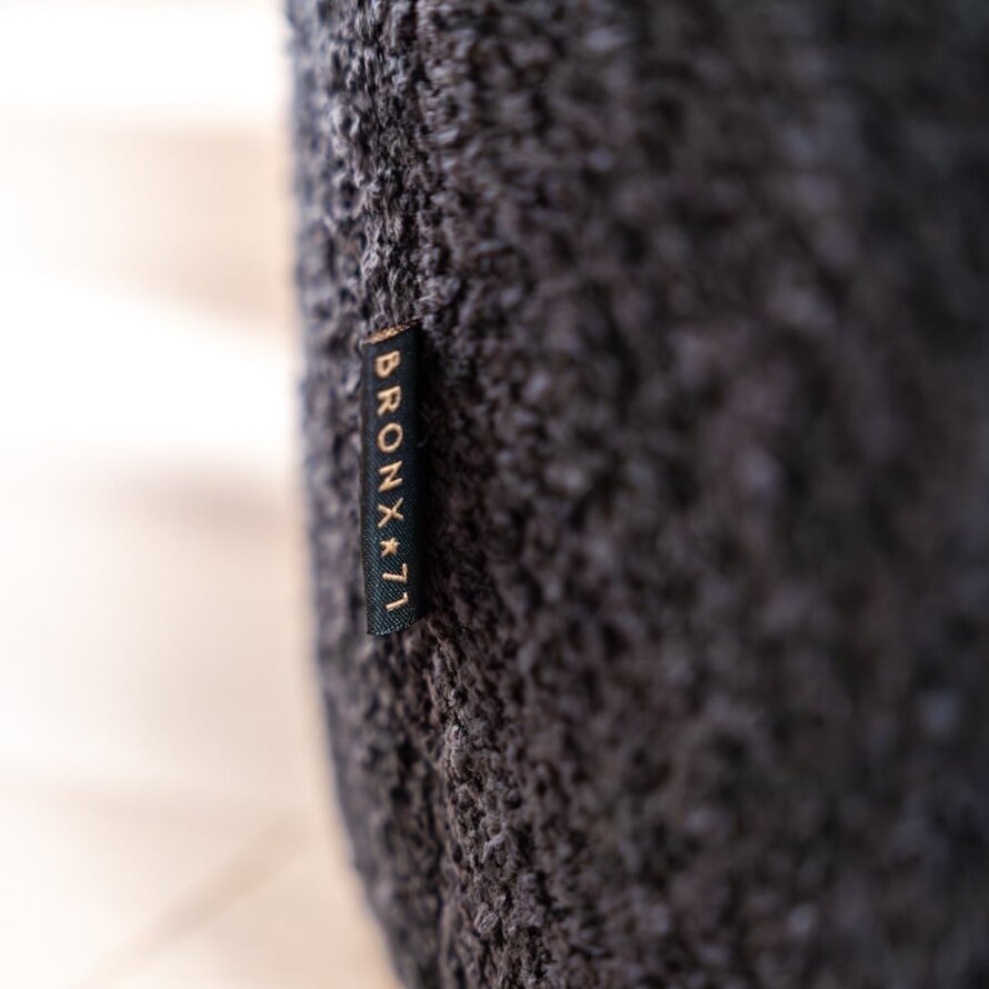 Poef/Hocker Nora zwart bouclé