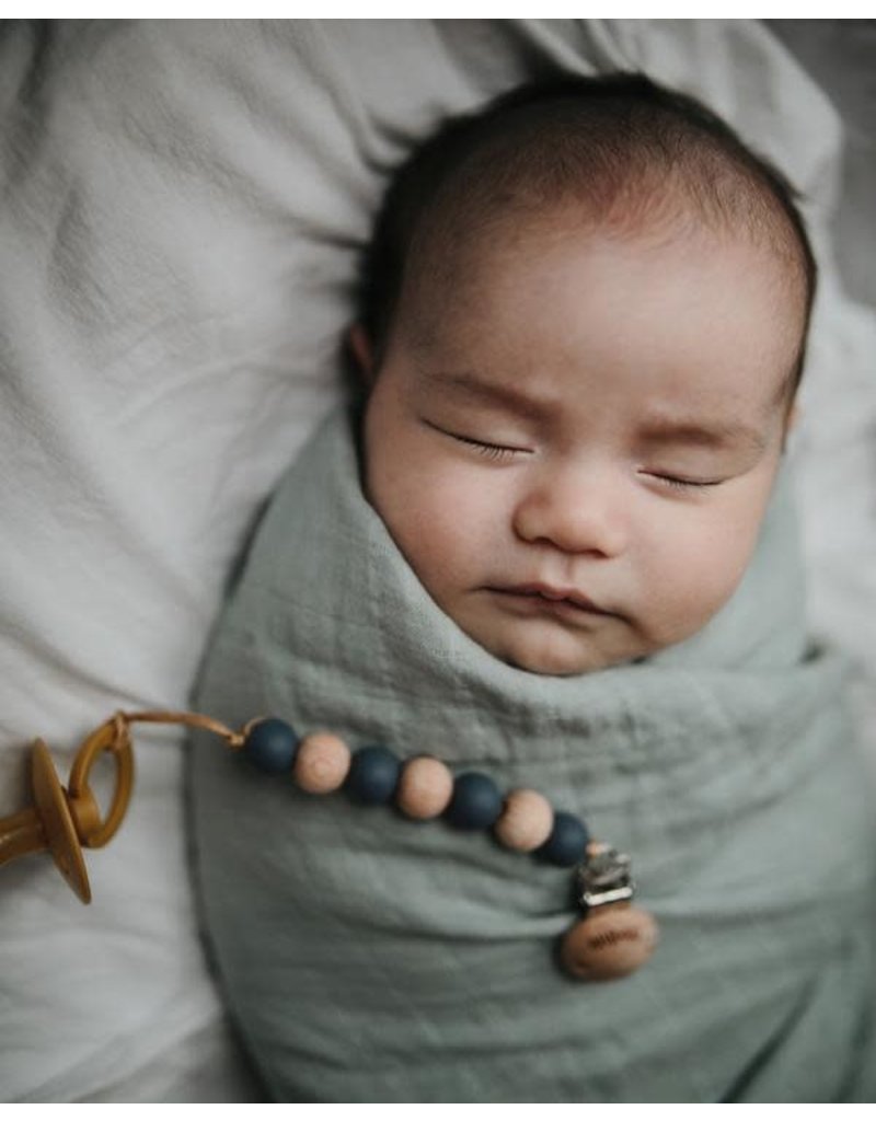 Mushie Mushie swaddle Roman Green