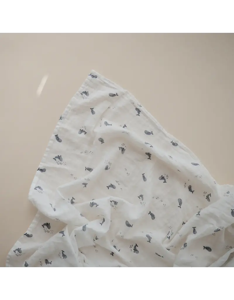 Mushie swaddle whales