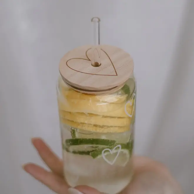 Heart shaped lid for drinking glass