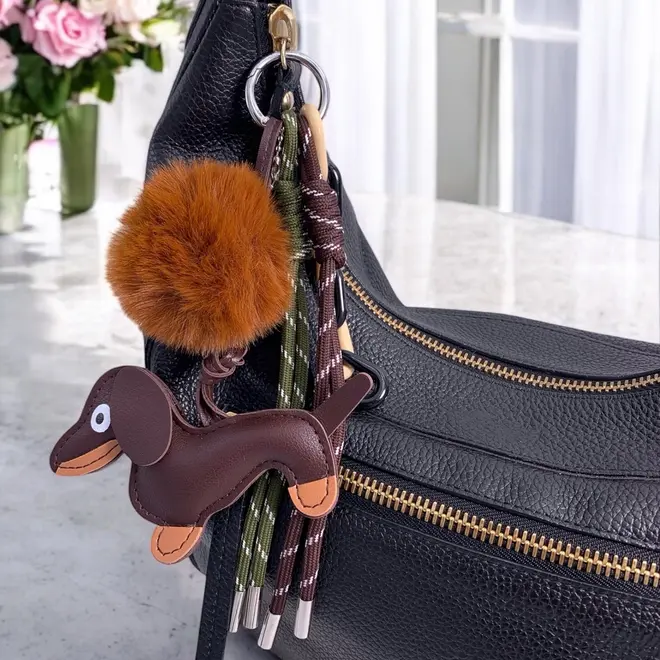 Tas- en sleutelhanger Teckel Pompon