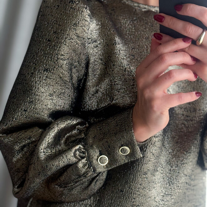 The gold shimmer dress